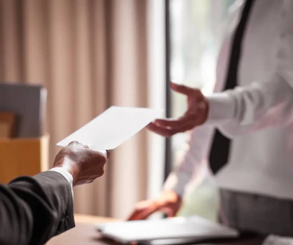 image of an employee being handed a notice of termination