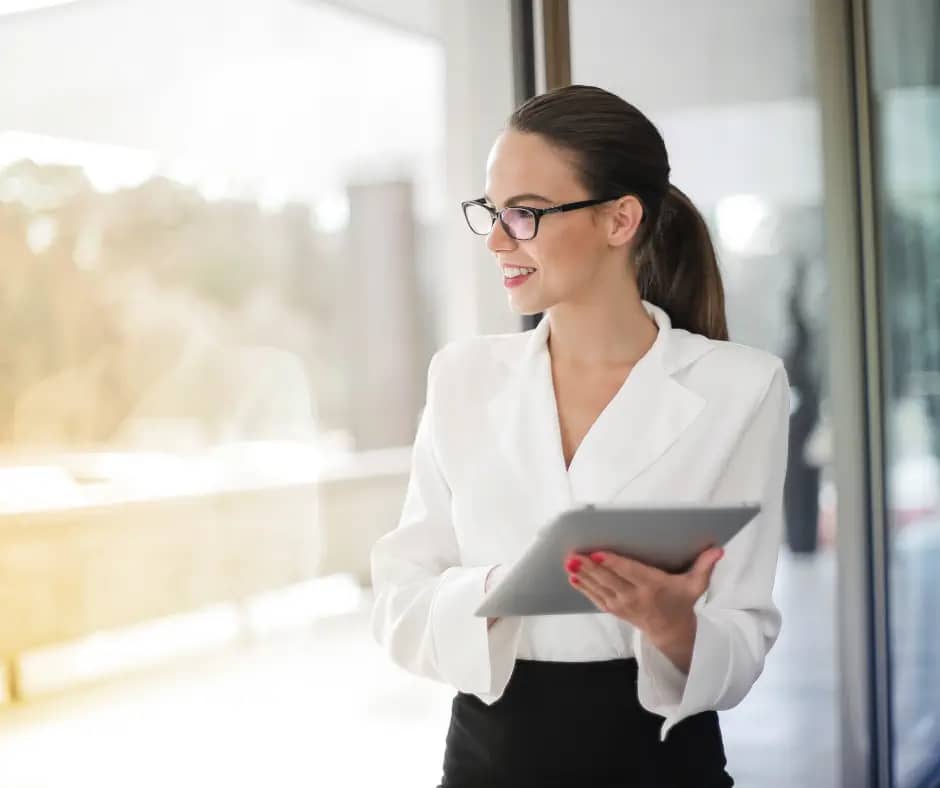professional executive woman with a clipboard
